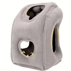 Grey inflatable travel pillow with face rest and arm openings